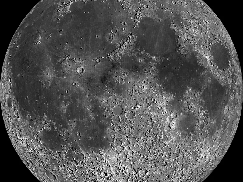 The full face of the Moon: grey highlands, dark smooth patches and bright craters with rays